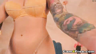 Red Haired Tattooed Woman Playing With Her Huge Dildo